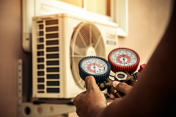 Professional Air Conditioning Service technician working in East Windsor, CT